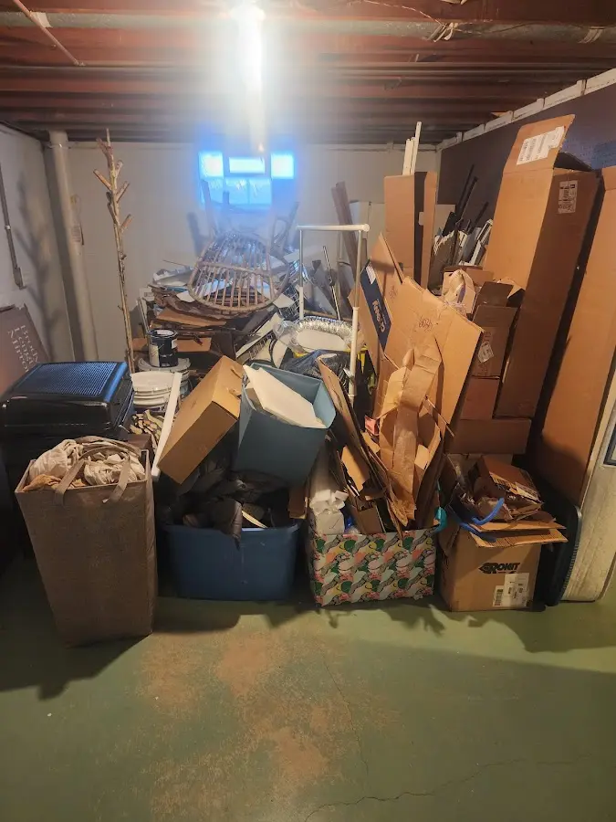 Roll-off dumpster container at job site for Yard Waste Dumpster Rental in Pembroke Park